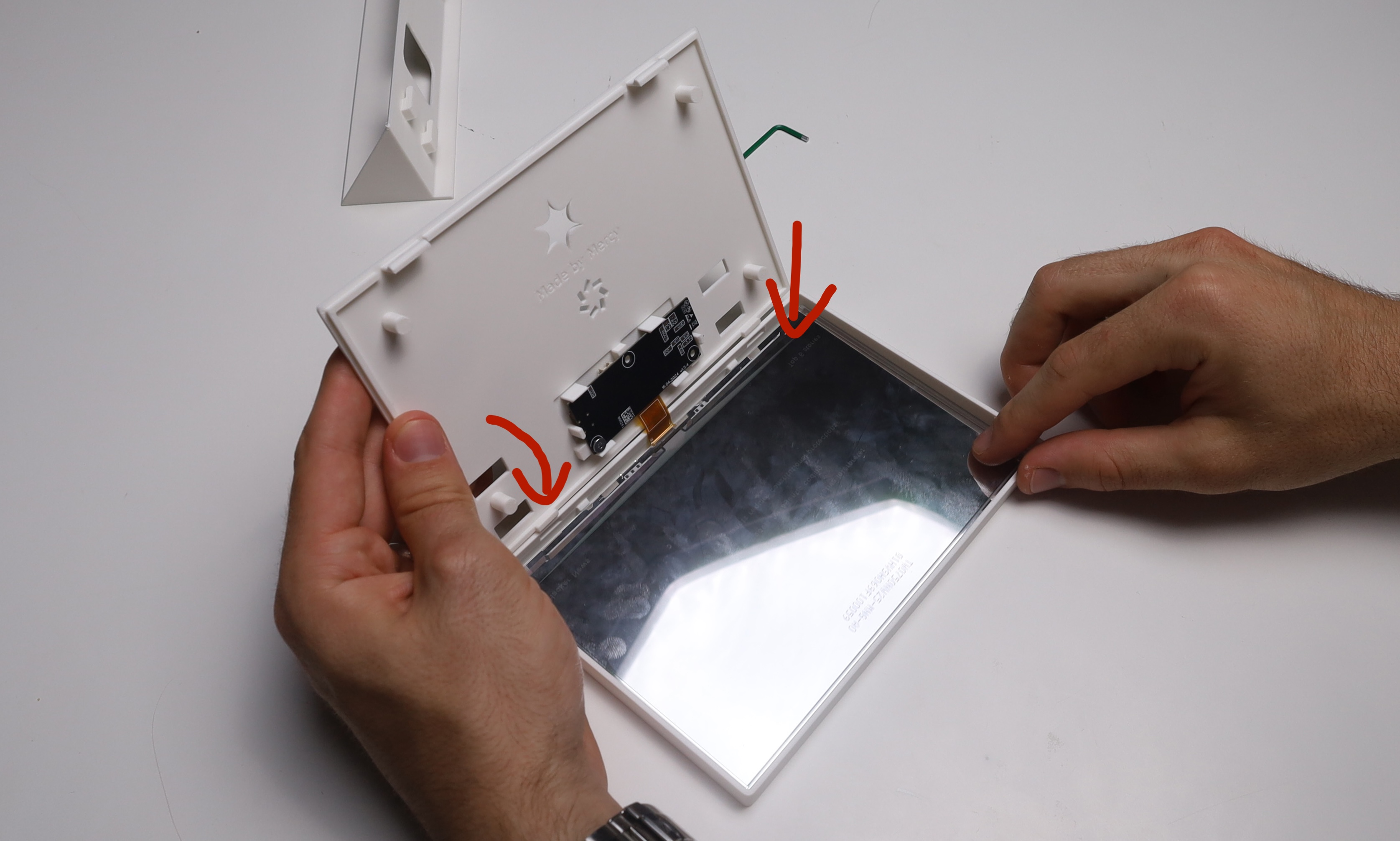 Placing the display into the frame